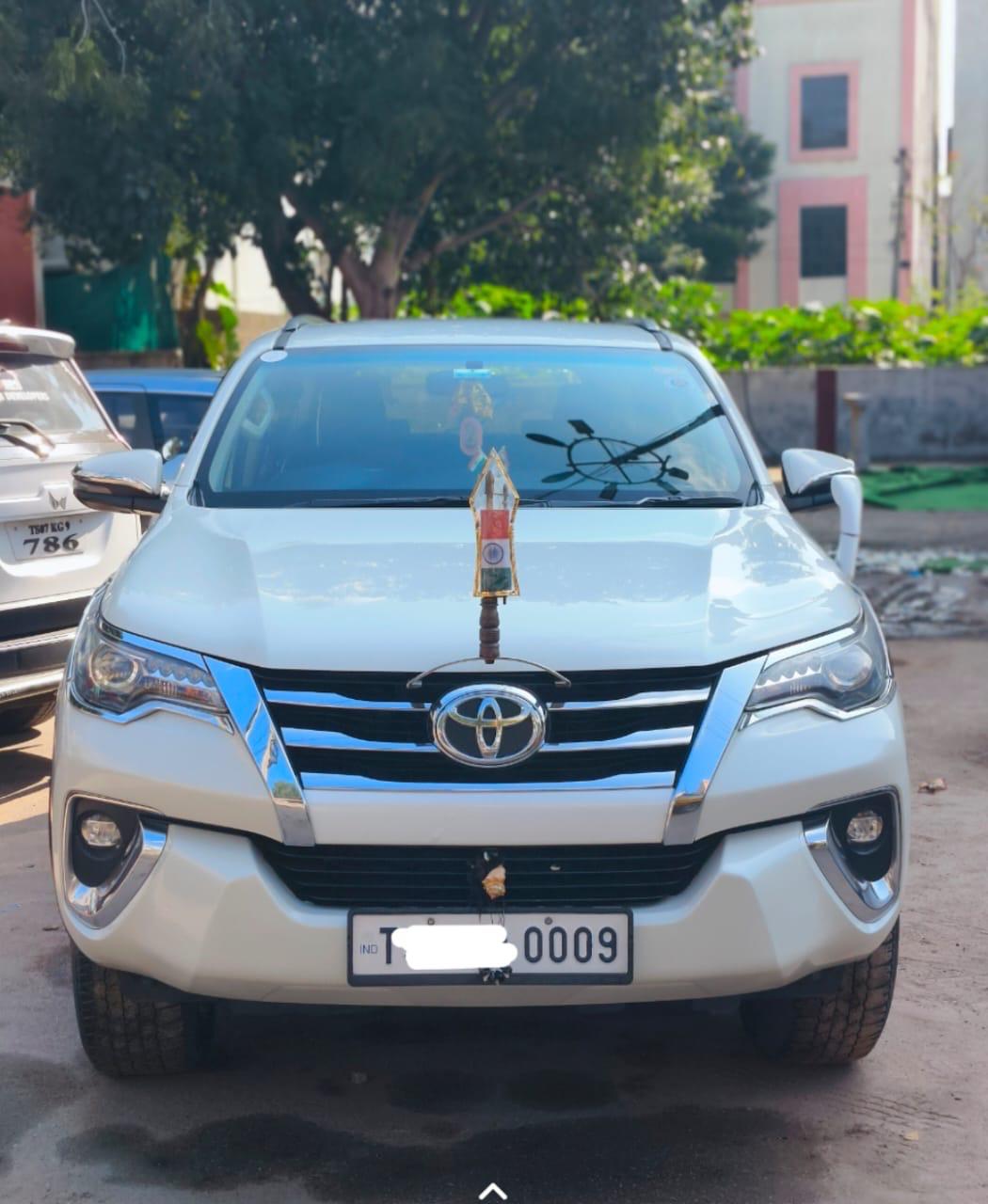 White Toyota Fortuner front view